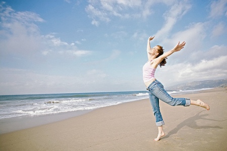 woman-beach-dancing